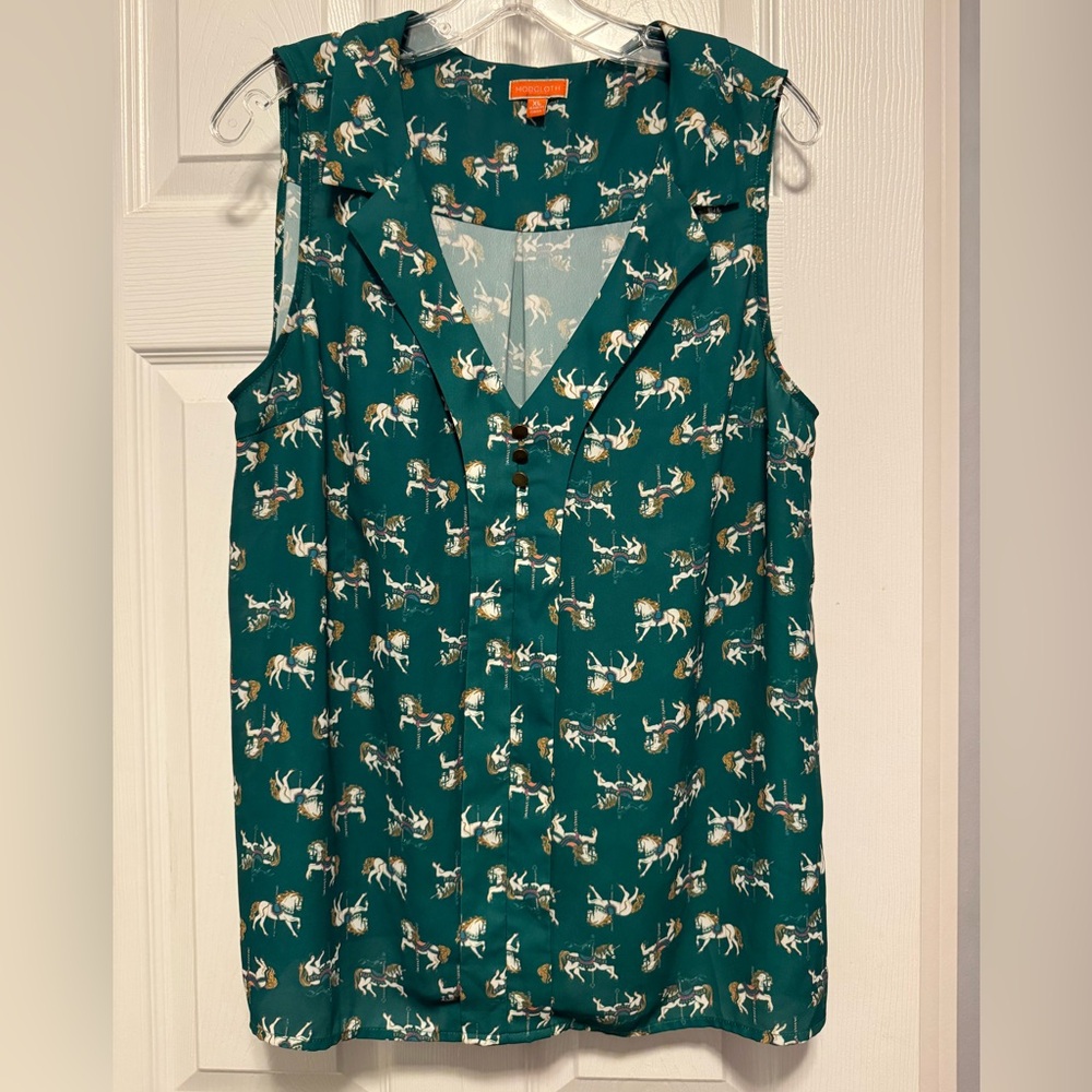 Green carousel horse sleeveless blouse